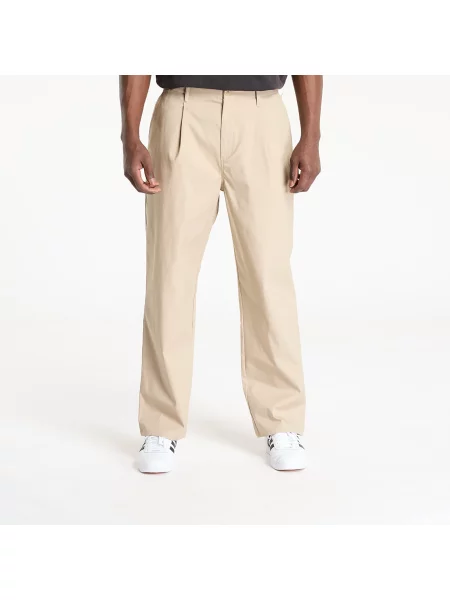 Spodnie New Balance – beżowe