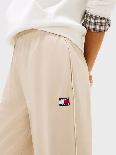 Спортивні штани Tommy Jeans бежеві