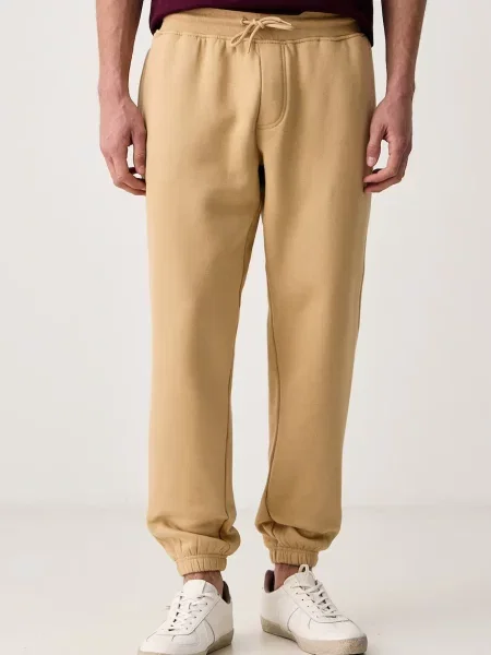 Tommy Jeans Pantaloni de trening bej