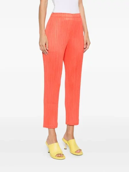Kalhoty Pleats Please Issey Miyake oranžové