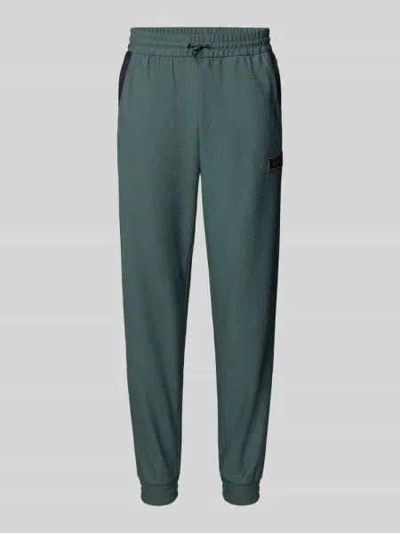 Spodnie dresowe o kroju regular fit z fakturowanym wzorem Ea7 Emporio Armani zielony