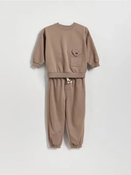 Брюки Reserved с аппликацией