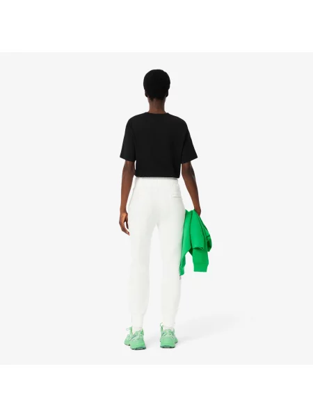 Зауженные спортивные штаны Lacoste белые