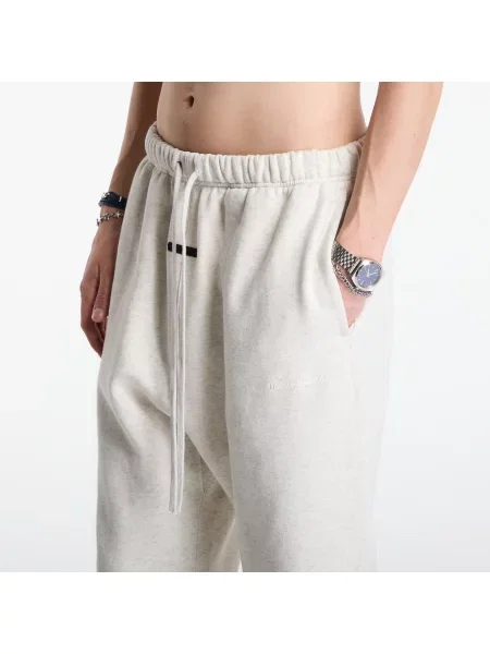 Klasické športové nohavice Fear Of God Essentials rozšírené