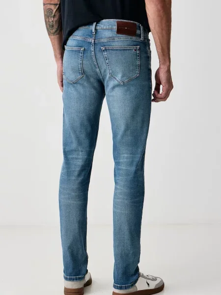 Jeansy Tommy Hilfiger z logo niebieskie