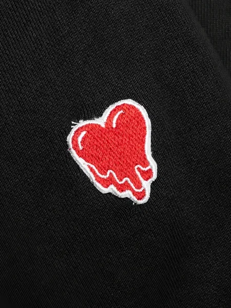 Pantaloni sport Emotionally Unavailable cu motiv cu inimi cu autograf negru