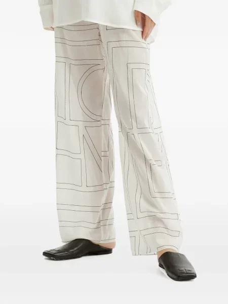 Pantaloni Toteme cu broderie alb