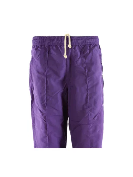 Spodnie New Balance fioletowe