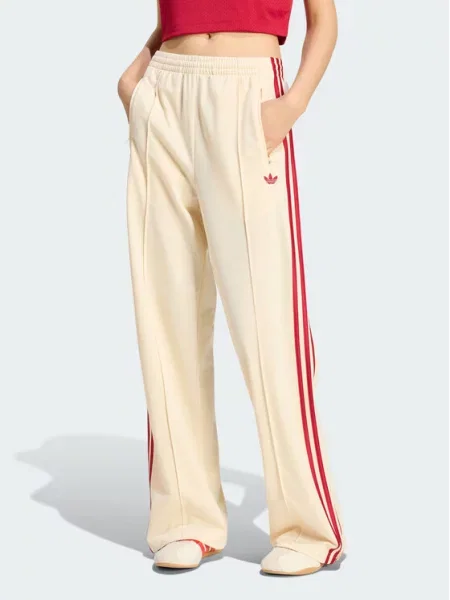 Spodnie dresowe Adidas Originals żółte