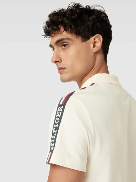 Koszulka polo o kroju regular fit z paskami w kontrastowym kolorze Tommy Hilfiger beżowe