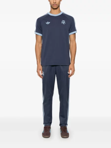 Dzianinowe spodnie Adidas niebieskie