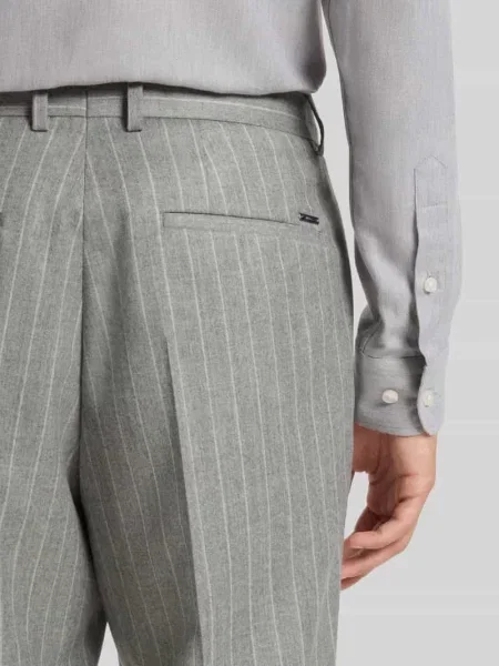 Spodnie do garnituru o kroju regular fit z czystej żywej wełny model ‘GENIUS’ Boss