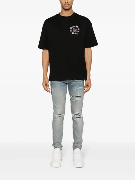 Skinny jeansy skinny Amiri z dziurami niebieskie