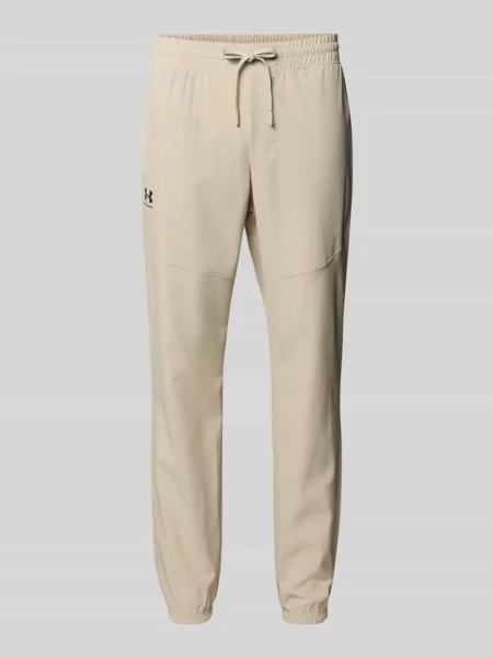 Spodnie dresowe o kroju relaxed fit z nadrukiem z logo Under Armour czarne
