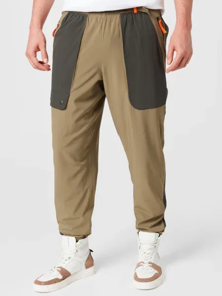 UNDER ARMOUR Športové nohavice Rush olivová / tmavozelená oranžová
