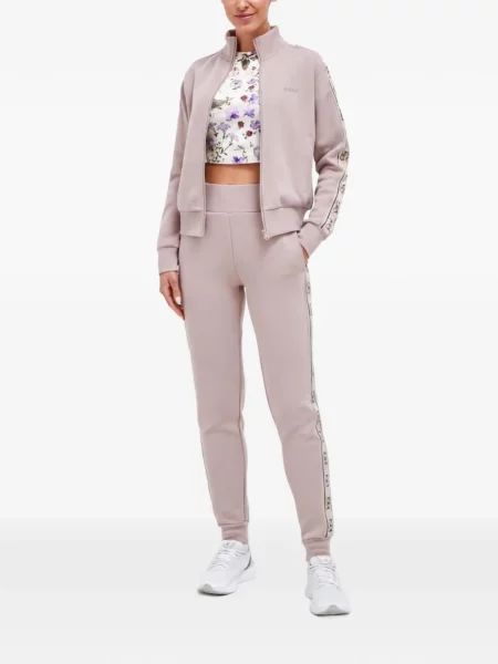 Pantaloni Guess cu dungi alergare