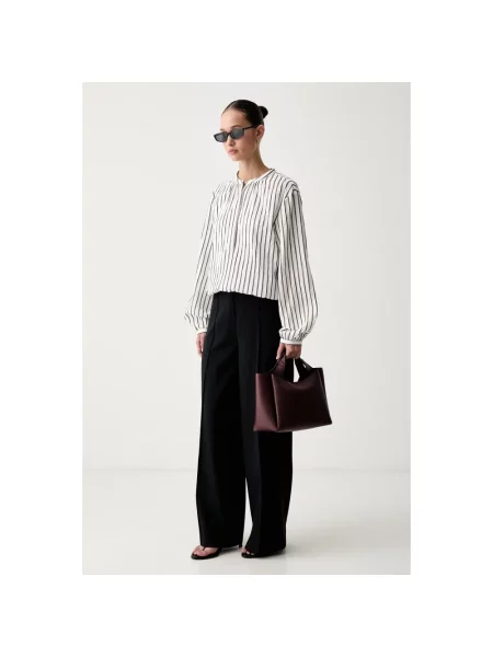 DKNY spodnie garniturowe niebieskie