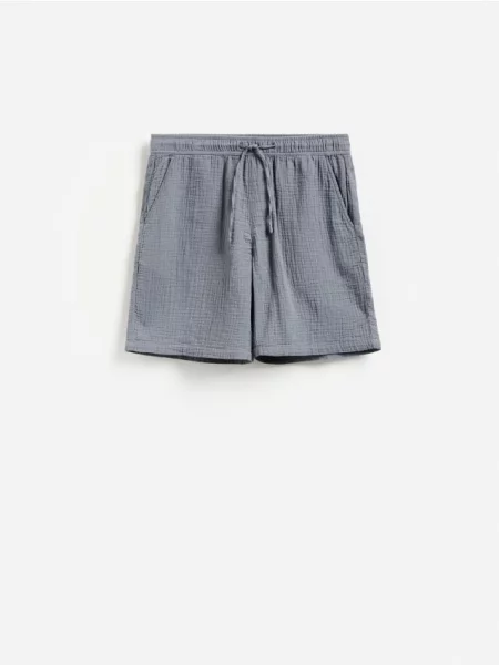 Reserved Pantaloni scurți jogger din muselină turcoaz-deschis