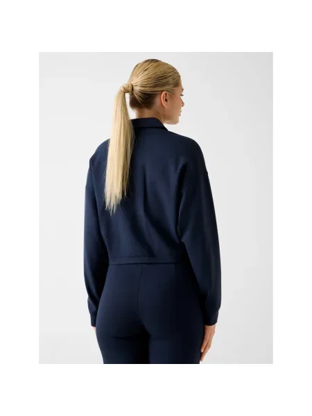 Orezané bunda Guess modrá
