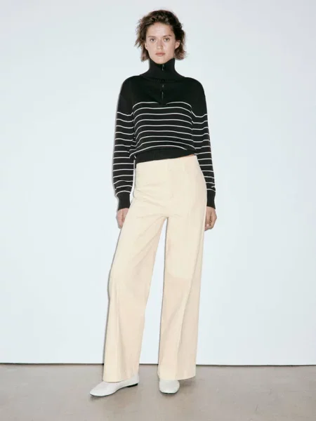 Jeansy wide leg z wysokim stanem i przeszyciami waniliowy Kobieta 50 MANGO