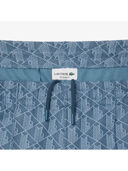Lacoste Spodnie Dresowe Z Monogramem Paris niebieskie