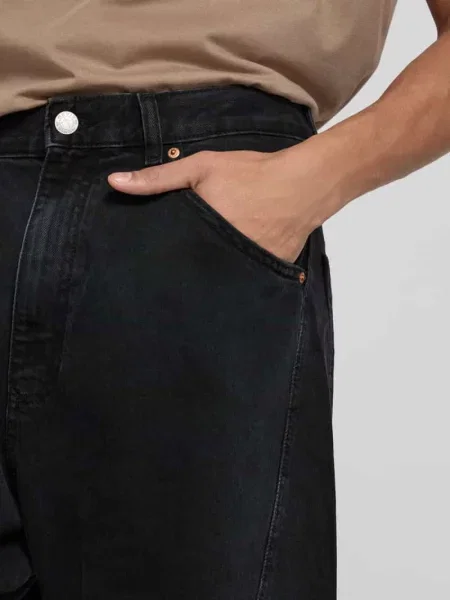 Jeansy o kroju barrel fit z czystej bawełny z z tyłu Review czarne