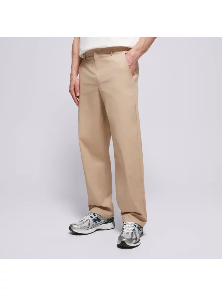 New Balance Spodnie Athletics Standard Pant beżowe