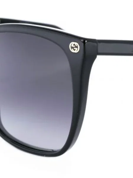 Sluneční brýle Gucci Eyewear s přechodem barev černé