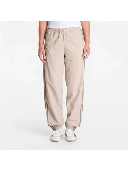 Spodnie dresowe adidas Firebird Woven Pants UNISEX Khaki Three L