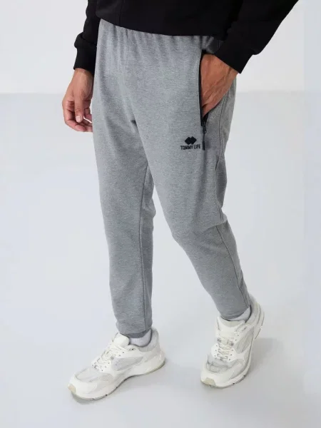 Tommy Life Sportnadrágok szürke