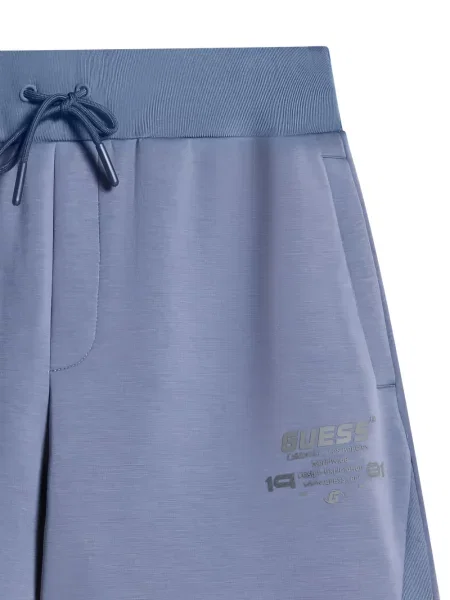 Pantaloni Guess cu imagine alergare albastru