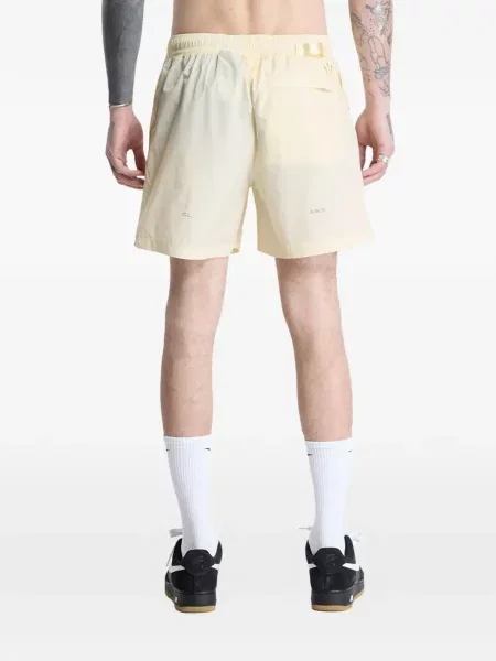 Pantaloni scurți Nike cu autograf galben