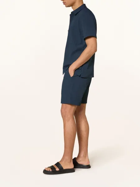 Сhinosy Calvin Klein niebieskie