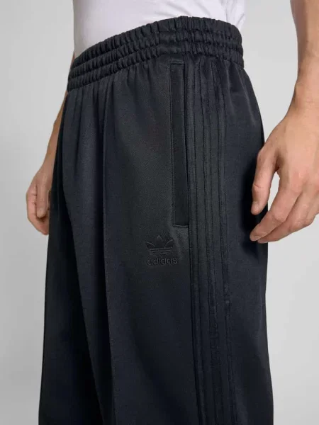 Spodnie dresowe Adicolor Baggy Fit Firebird czarne