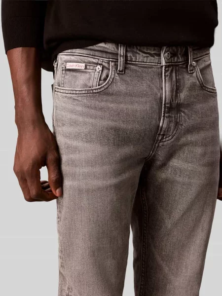 Jeansy o kroju tapered fit z mieszanki bawełny Calvin Klein Jeans