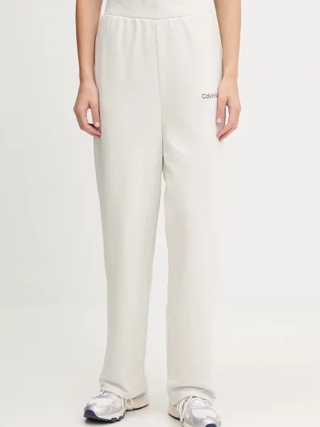 Calvin Klein Performance spodnie dresowe gładkie beżowy