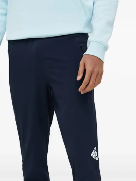 Športové nohavice Adidas sivá