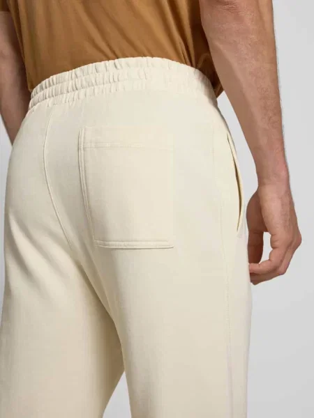 Spodnie dresowe z elastycznym pasem model ‘KANE’ Jack & Jones biały