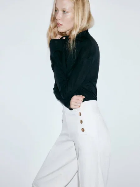 Jeansy wide leg z bocznymi Kobieta 38 MANGO biały