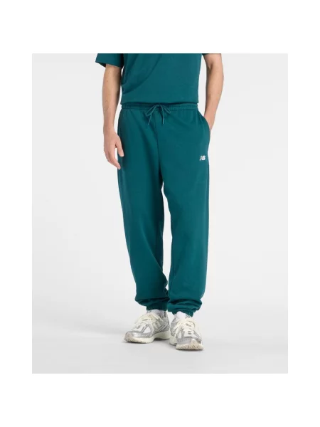Spodnie New Balance Sport Essentials French Terry niebiesko-turkusowe S niebieskie