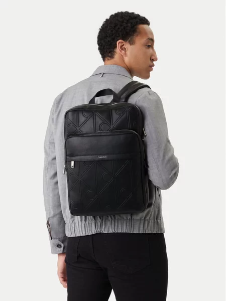 Calvin Klein Saszetka Emblem Aop Emboss Slim Square Bp czarny