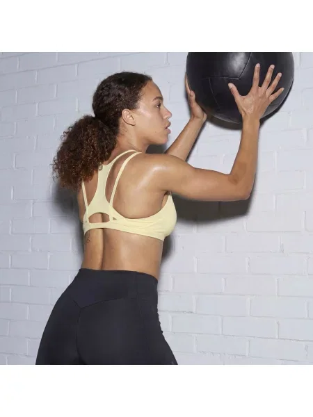 Podprsenka slehkým zpevněním Optime Workout Strappy žlutá