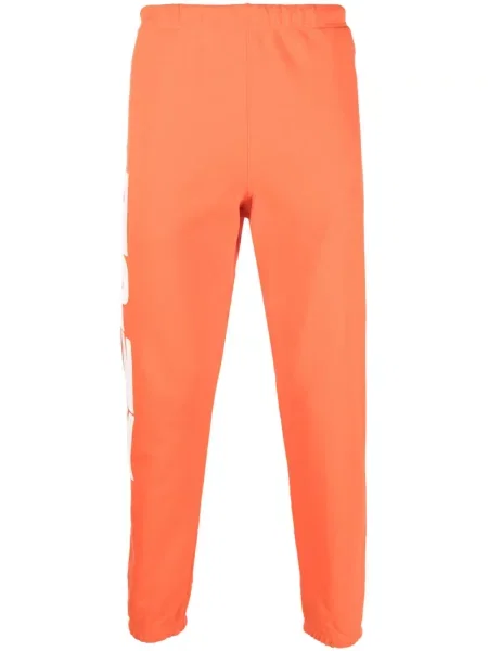 Zúžené kalhoty Heron Preston s potiskem oranžové