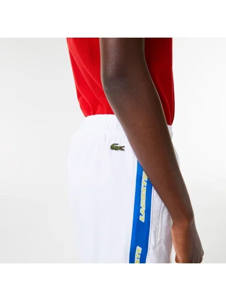 Lacoste Spodnie Dresowe Holiday Unisex Z Nadrukiem Regular Fit białe