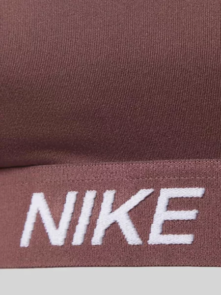 Stanik z detalami z logo i regulowanymi ramiączkami Nike Training