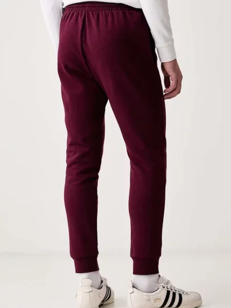 Adidas spodnie dresowe z bawełną Essentials Feelcozy