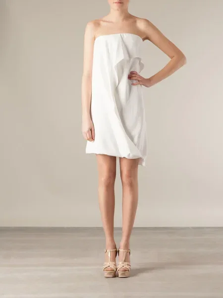 Rochie Maison Rabih Kayrouz drapată de costum alb