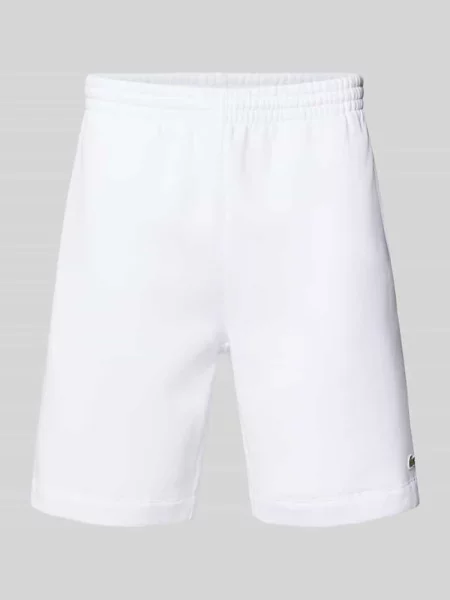 Szorty z dzianiny dresowej o kroju regular fit z naszywką z logo Lacoste białe