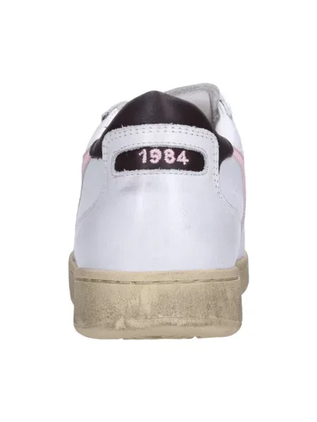 Sneakersy Diadora skórzane z przetarciami białe
