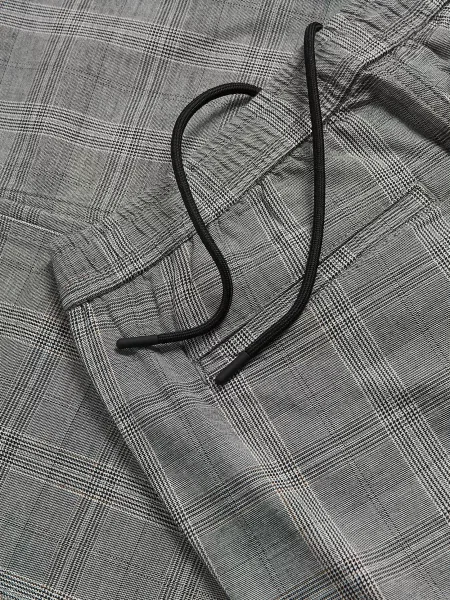 Клетчатые брюки Reserved серые